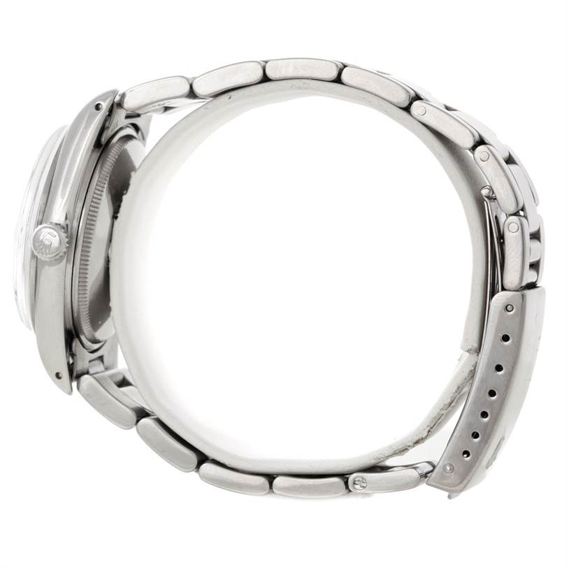 This side view shows the case, crown, and bracelet of the Rolex Air-King 5700 Men's Stainless Steel Black Dial 5700 Men's Stainless Steel Black Dial watch.