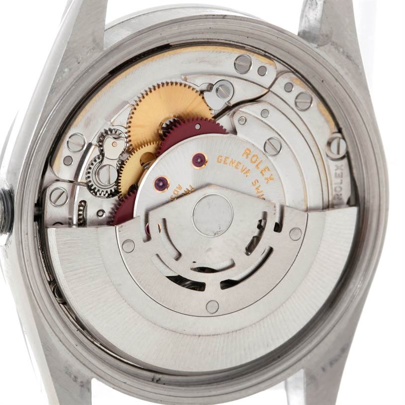 This image shows the exposed movement and inner mechanism of the Rolex Air-King 14000 Men's Stainless Steel Blue Dial 14000 Men's Stainless Steel Blue Dial watch from a rear angle.