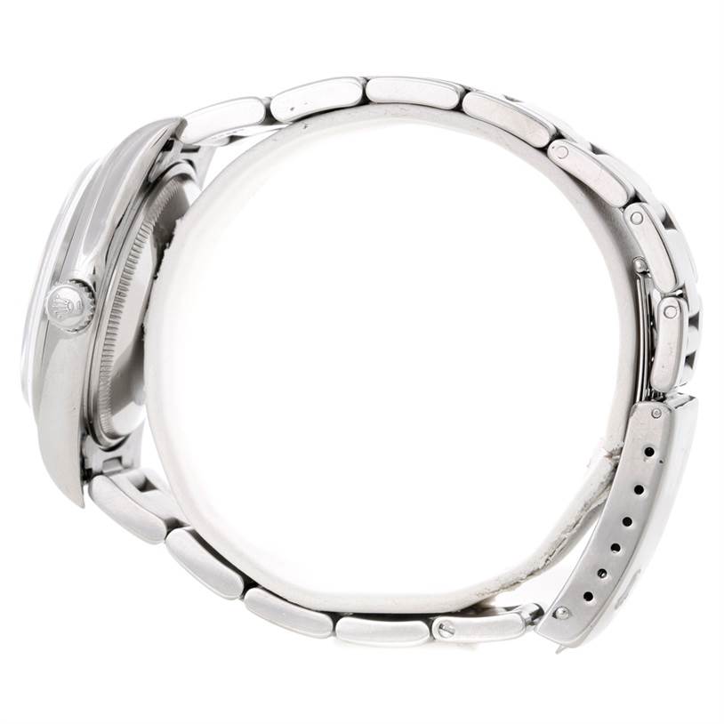 This image shows a side profile of the Rolex Air-King 14000 Men's Stainless Steel Blue Dial 14000 Men's Stainless Steel Blue Dial watch, displaying its case, crown, and bracelet.