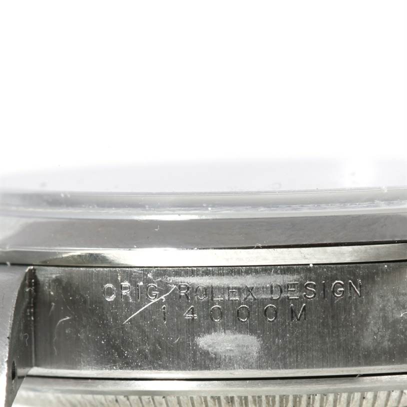 This close-up angle displays the brushed metal case sides and engraved model number of the Rolex Air-King 14000 Men's Stainless Steel Blue Dial 14000 Men's Stainless Steel Blue Dial watch.