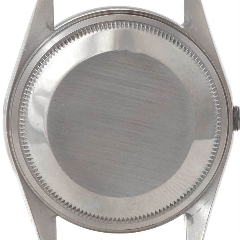 The image shows the back case of a Rolex Air-King 14000 Men's Stainless Steel Blue Dial 14000 Men's Stainless Steel Blue Dial watch from a top-down angle.