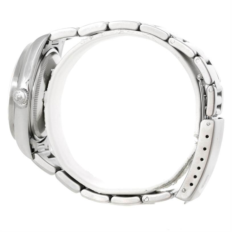 The image shows a side profile of the Rolex Air-King 14010 Men's Stainless Steel Silver Dial 14010 Men's Stainless Steel Silver Dial watch, featuring its stainless steel case, bezel, crown, and metal bracelet.