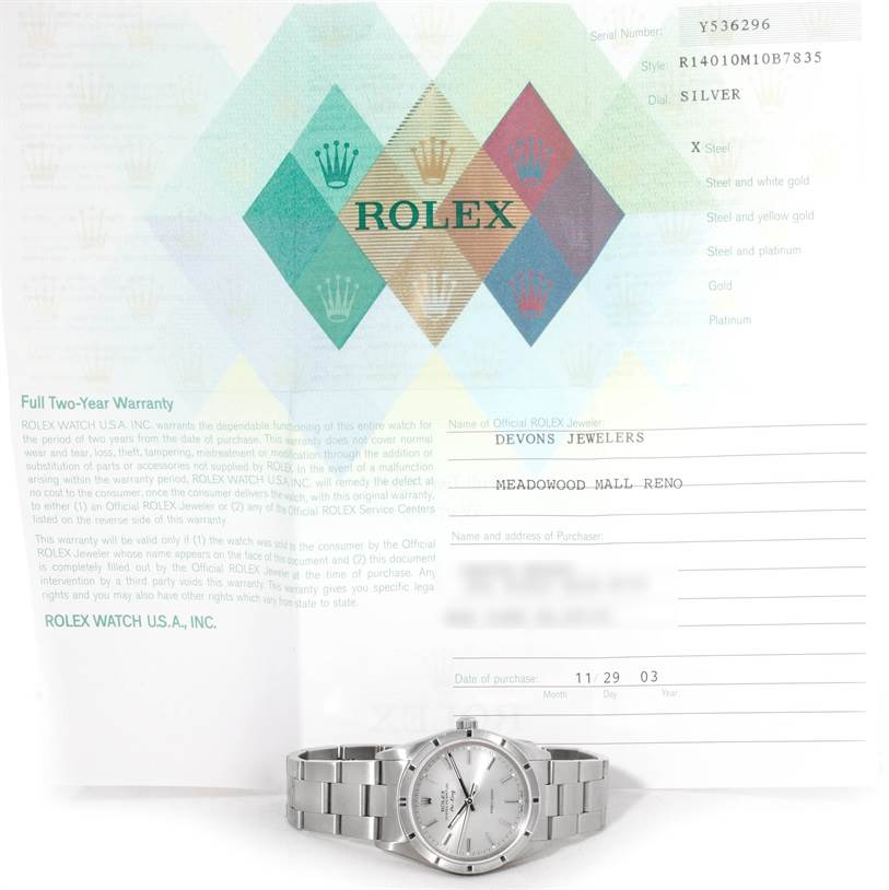 The image displays a Rolex Air-King 14010 Men's Stainless Steel Silver Dial 14010 Men's Stainless Steel Silver Dial watch lying flat with its warranty certificate in the background.