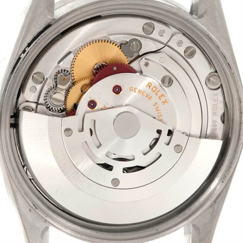 This image shows a close-up view of the movement and internal components of the Rolex Air-King 14010 Men's Stainless Steel Silver Dial 14010 Men's Stainless Steel Silver Dial watch.