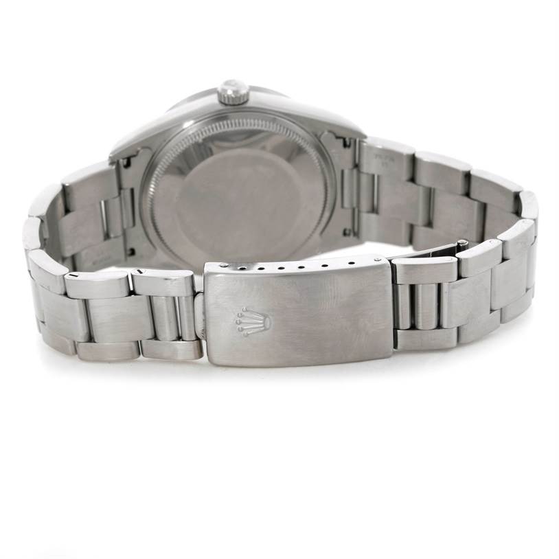 The image shows the rear view of a Rolex Air-King 14010 Men's Stainless Steel Silver Dial 14010 Men's Stainless Steel Silver Dial watch, focusing on its closed clasp and stainless steel bracelet.
