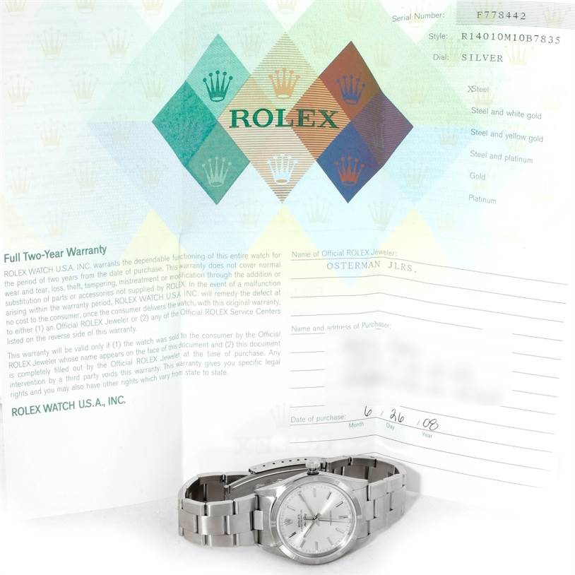 The image shows a Rolex Air-King 14010 Men's Stainless Steel Silver Dial 14010 Men's Stainless Steel Silver Dial watch placed flat, with its warranty card and documents visible from a top-down angle.