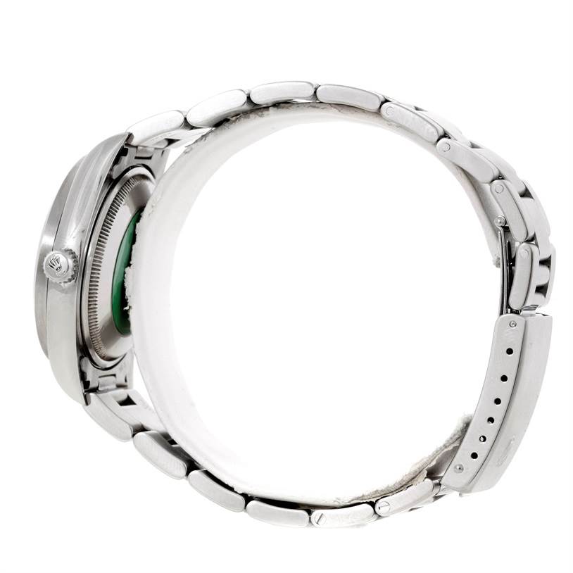 The image shows a side view of the Rolex Air-King 14010 Men's Stainless Steel Black Dial 14010 Men's Stainless Steel Black Dial watch, highlighting its case, crown, and bracelet.