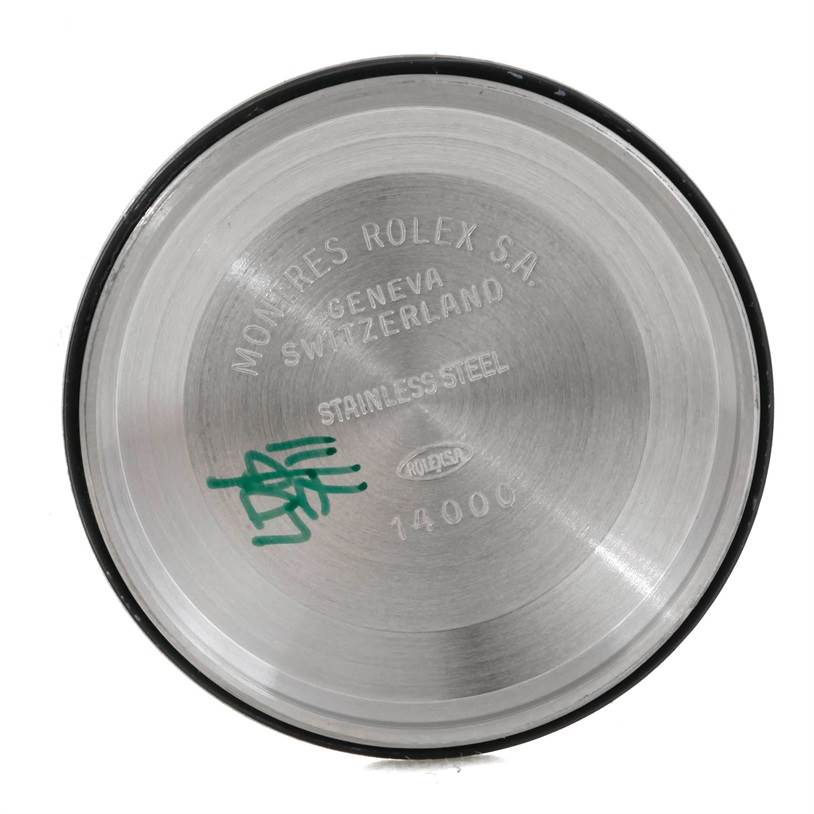 This is the interior view of the case back of a Rolex Air-King 14010 Men's Stainless Steel Black Dial 14010 Men's Stainless Steel Black Dial watch, showing engraved text and model number.