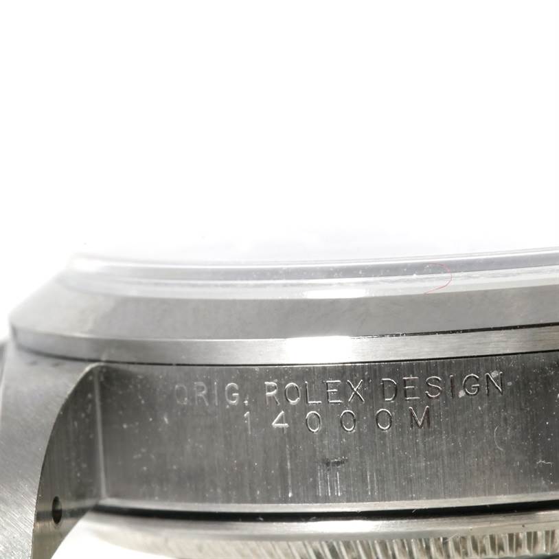 The image shows a close-up side view of the case of a Rolex Air-King 14000 Men's Stainless Steel Black Dial 14000 Men's Stainless Steel Black Dial watch, highlighting the engraved design and model number.