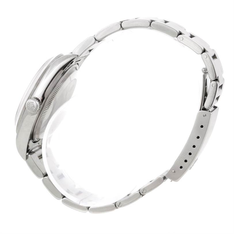 This image shows the side profile of a Rolex Air-King 14000 Men's Stainless Steel Black Dial 14000 Men's Stainless Steel Black Dial watch, highlighting its case, crown, and bracelet with the clasp.