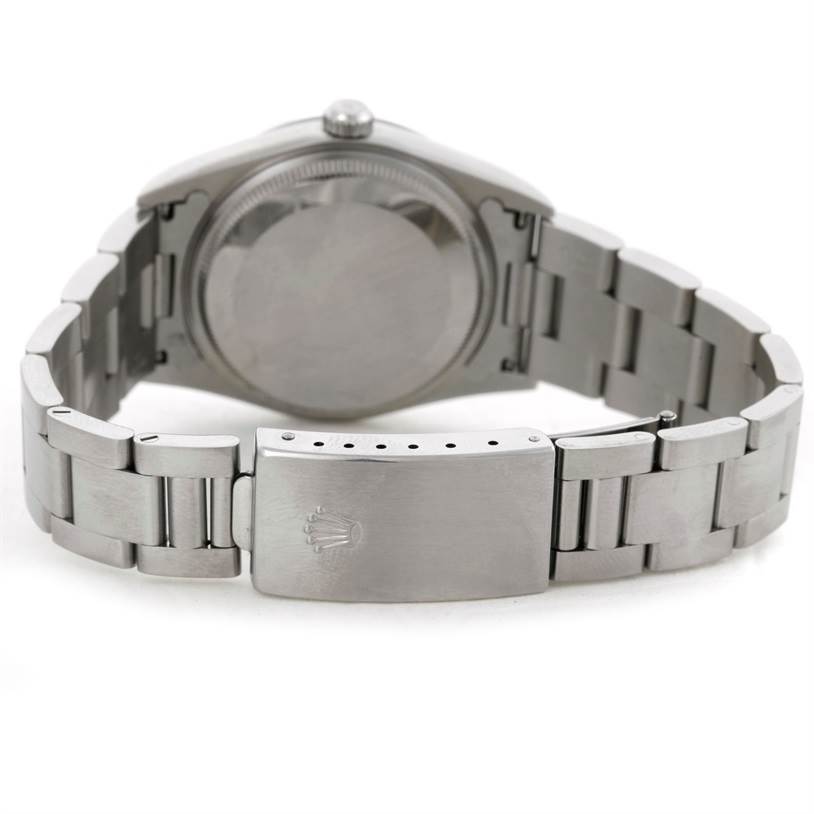 The image shows the back view of a Rolex Air-King 14000 Men's Stainless Steel Black Dial 14000 Men's Stainless Steel Black Dial watch, focusing on the bracelet, clasp, and case back.