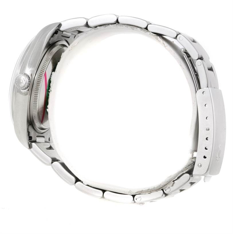 The image shows a side view of a Rolex Air-King 14000 Men's Stainless Steel Blue Dial 14000 Men's Stainless Steel Blue Dial watch focusing on the watch case, crown, and bracelet.