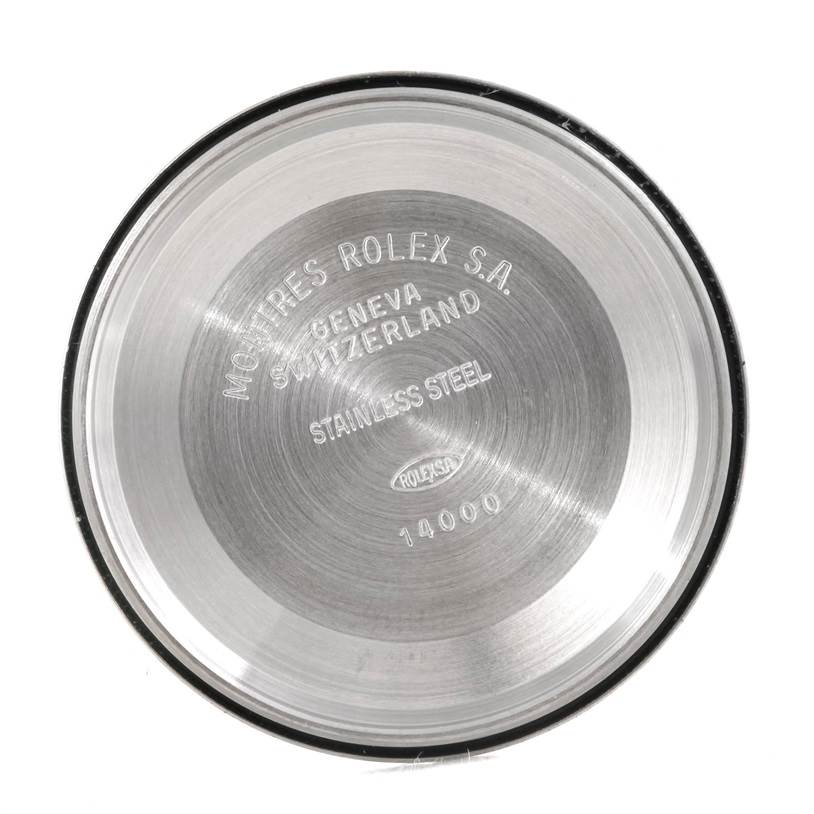 This image shows the inside of the case back of a Rolex Air-King 14010 Men's Stainless Steel White Dial 14010 Men's Stainless Steel White Dial model, with engravings indicating stainless steel material and model details.