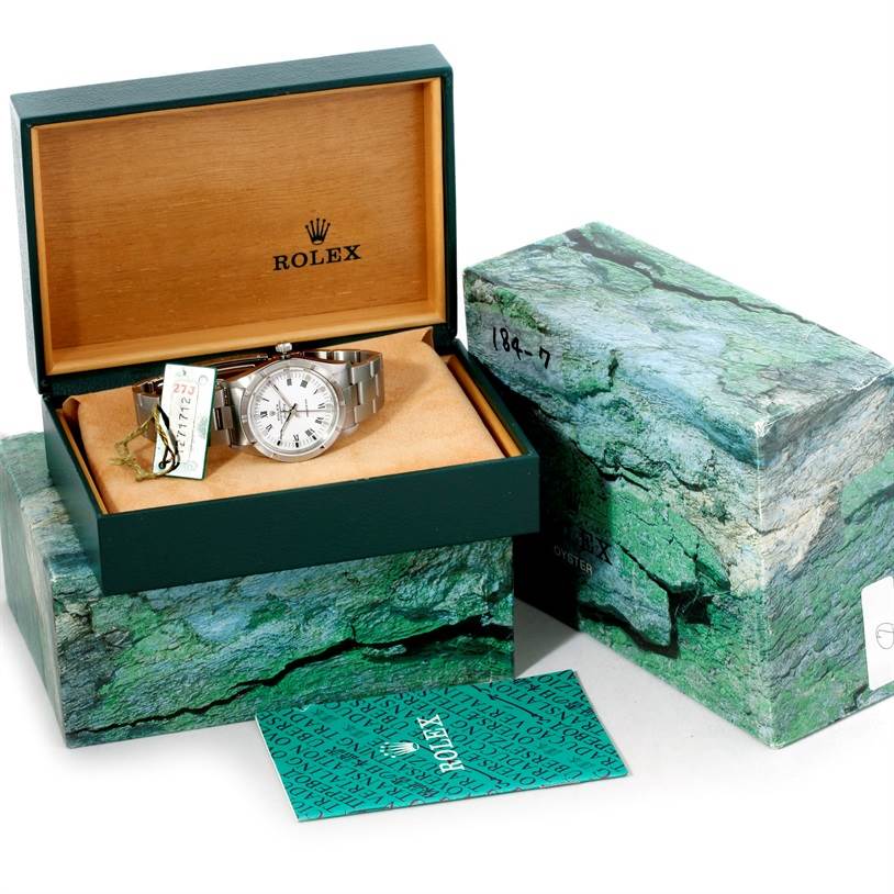 The image shows a Rolex Air-King 14010 Men's Stainless Steel White Dial 14010 Men's Stainless Steel White Dial watch from a slightly elevated front angle, in its open box with additional packaging and a card.
