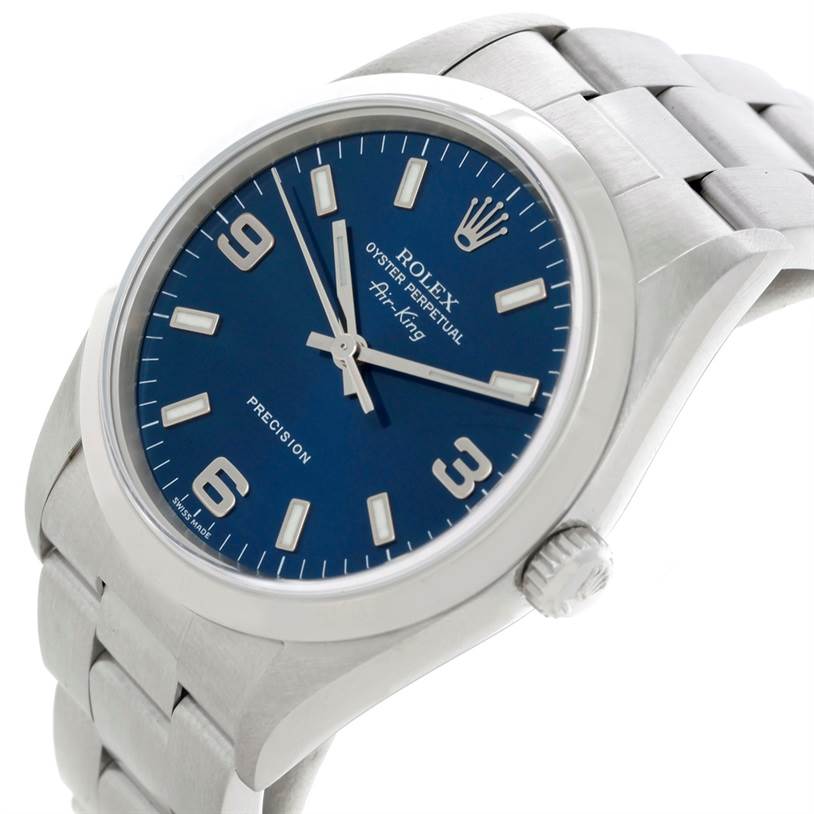 This image shows a Rolex Air-King 14000 Men's Stainless Steel Blue Dial 14000 Men's Stainless Steel Blue Dial watch at an angled view, highlighting its blue dial, crown, and part of its stainless steel bracelet.