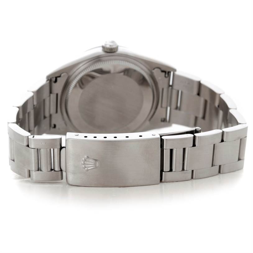 The image shows the back view of a Rolex Air-King 14000 Men's Stainless Steel Blue Dial 14000 Men's Stainless Steel Blue Dial watch, highlighting its clasp and stainless steel bracelet.