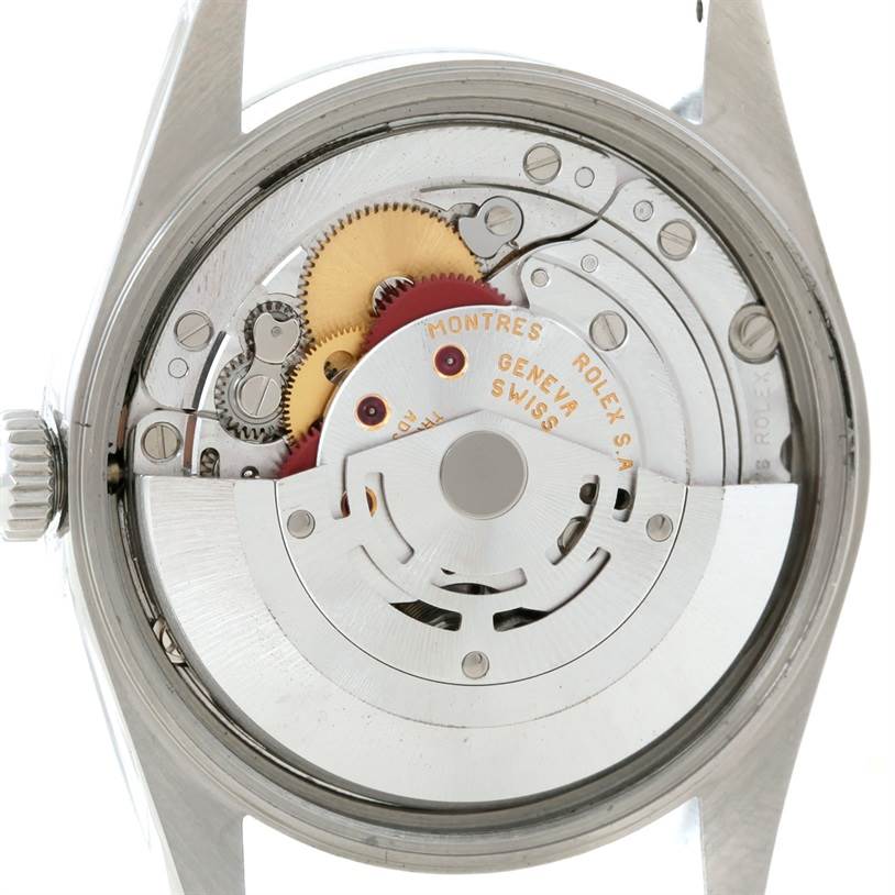 The image shows the back view, revealing the internal movement and gears of a Rolex Air-King 14000 Men's Stainless Steel Blue Dial 14000 Men's Stainless Steel Blue Dial watch.