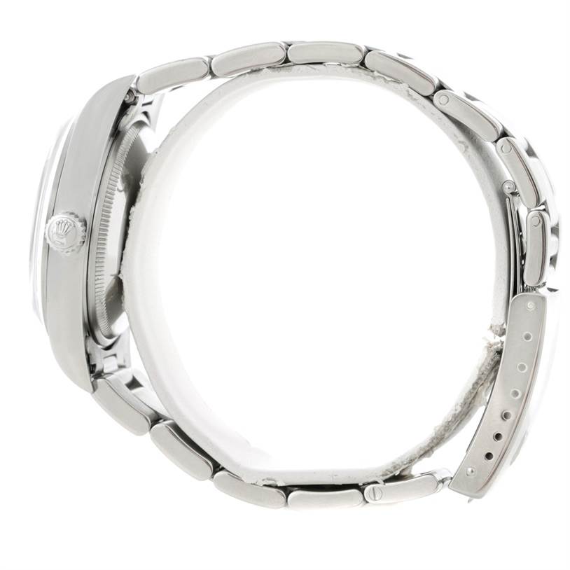 The image shows a side view of a Rolex Air-King 14000 Men's Stainless Steel Blue Dial 14000 Men's Stainless Steel Blue Dial watch, highlighting its bezel, crown, and bracelet.