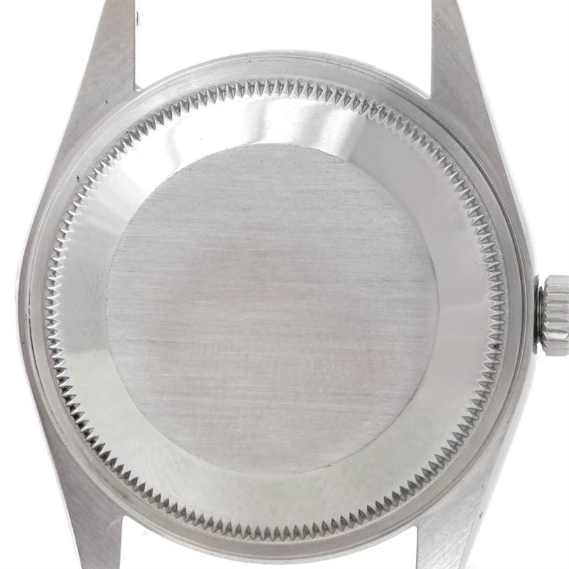 The image shows the case back and crown of a Rolex Air-King 14000 Men's Stainless Steel Blue Dial 14000 Men's Stainless Steel Blue Dial watch from a rear angle.