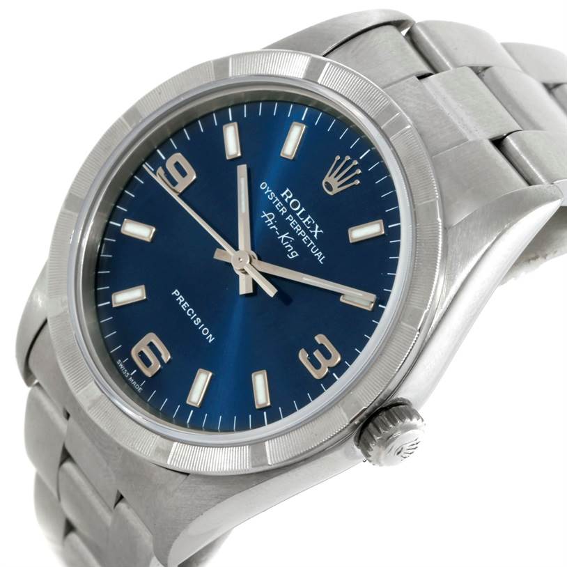 The Rolex Air-King 14010 Men's Stainless Steel Blue Dial 14010 Men's Stainless Steel Blue Dial watch is shown at a slight angle, displaying its blue dial, crown, case, and part of the stainless steel bracelet.