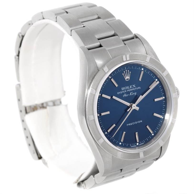 The Rolex Air-King 14010 Men's Stainless Steel Blue Dial 14010 Men's Stainless Steel Blue Dial watch is shown in a three-quarter view, displaying its face, bezel, case, and part of the bracelet.
