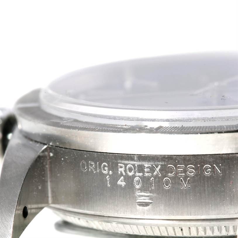 The image shows a close-up side view of a Rolex Air-King 14010 Men's Stainless Steel Blue Dial 14010 Men's Stainless Steel Blue Dial watch bezel and case with model number 14010M engraved.