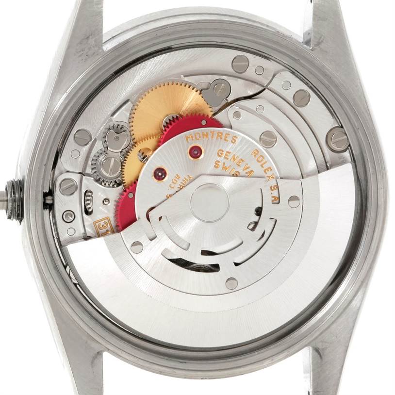 This image shows the back view of a Rolex Air-King 14010 Men's Stainless Steel Blue Dial 14010 Men's Stainless Steel Blue Dial watch, revealing its internal mechanical components.