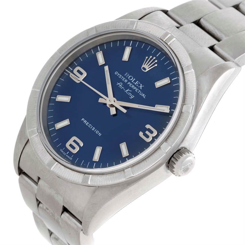The Rolex Air-King 14010 Men's Stainless Steel Blue Dial 14010 Men's Stainless Steel Blue Dial watch is shown from a slight side view, displaying the dial, bezel, crown, and part of the bracelet.