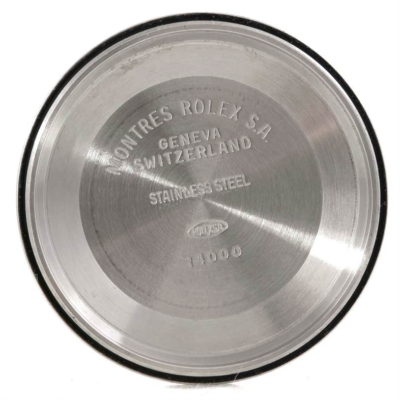 The image shows the inside of the case back of a Rolex Air-King 14010 Men's Stainless Steel Black Dial 14010 Men's Stainless Steel Black Dial watch, displaying engravings and brand details.