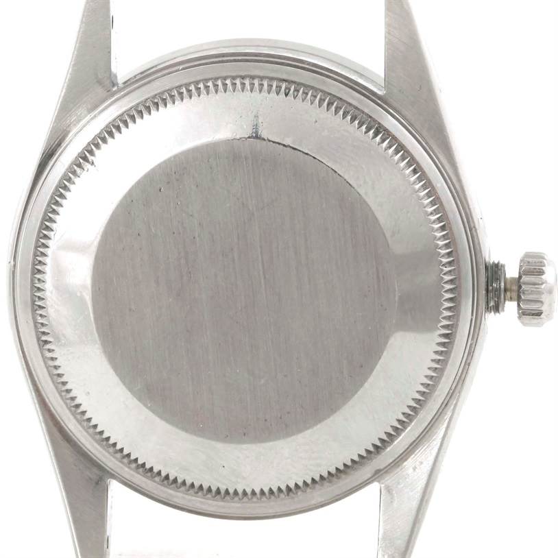 This image shows the back case and crown of a Rolex Air-King 14010 Men's Stainless Steel Black Dial 14010 Men's Stainless Steel Black Dial watch from a rear angle.