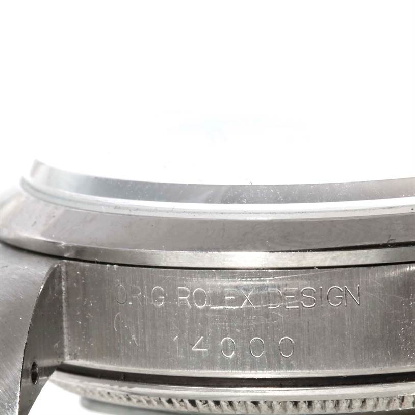 The image shows a close-up of the side of the Rolex Air-King 14000 Men's Stainless Steel Pink Dial 14000 Men's Stainless Steel Pink Dial watch case, displaying the engraved model number and "ORIG ROLEX DESIGN."