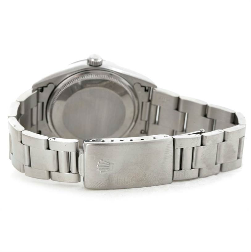 The image shows the back view of a Rolex Air-King 14000 Men's Stainless Steel Pink Dial 14000 Men's Stainless Steel Pink Dial watch, highlighting the bracelet and clasp.