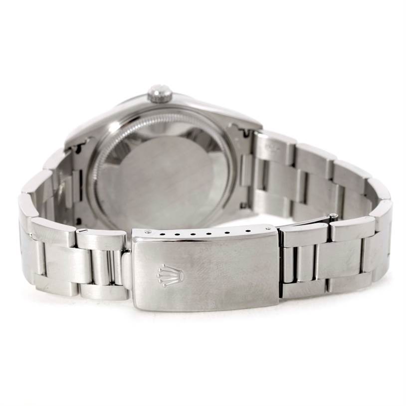 The image shows the back of a Rolex Air-King 14000 Men's Stainless Steel Blue Dial 14000 Men's Stainless Steel Blue Dial watch, highlighting the case back and the clasp of the bracelet.