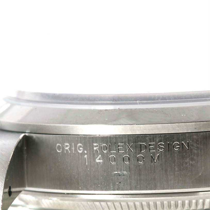 The image shows a close-up of the side case of a Rolex Air-King 14000 Men's Stainless Steel Blue Dial 14000 Men's Stainless Steel Blue Dial watch, highlighting the "ORIG. ROLEX DESIGN 14000M" engraving.