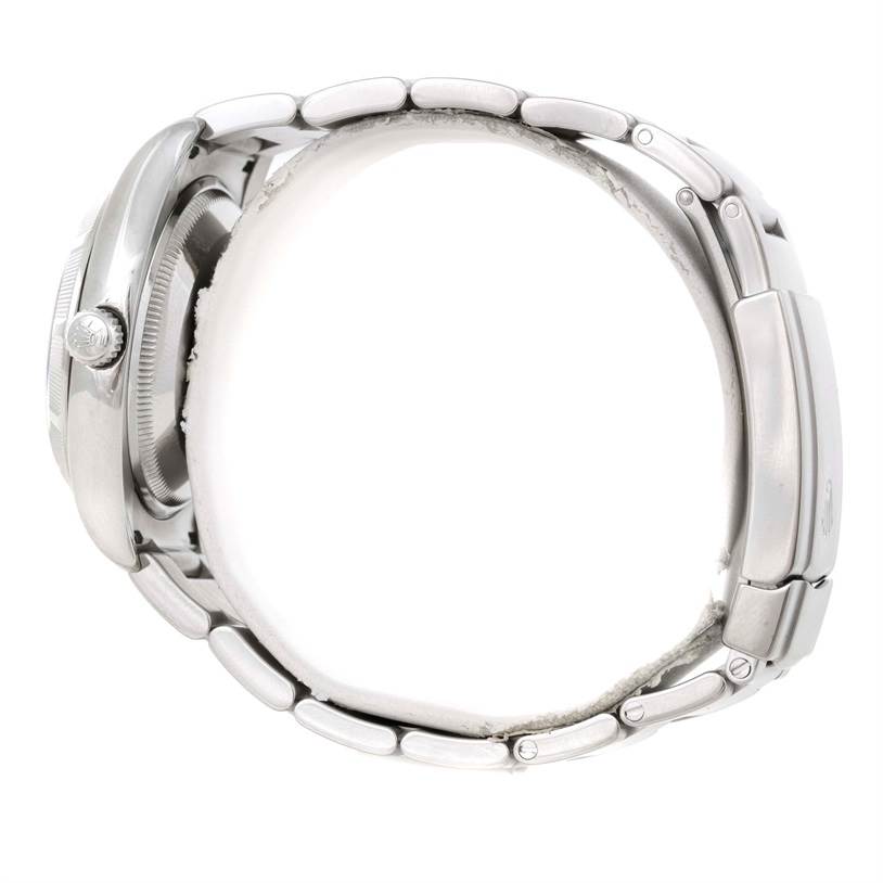 The image shows a side view of a Rolex Air-King 114210 Men's Stainless Steel Blue Dial 114210 Men's Stainless Steel Blue Dial watch, displaying the case and partially the bracelet links.