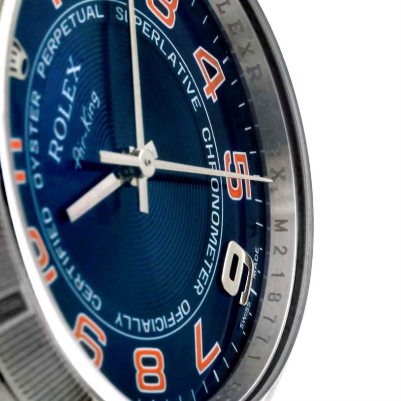 The image shows a close-up of the dial and partial bezel of a Rolex Air-King 114210 Men's Stainless Steel Blue Dial 114210 Men's Stainless Steel Blue Dial watch, with focus on the numerals and logo.