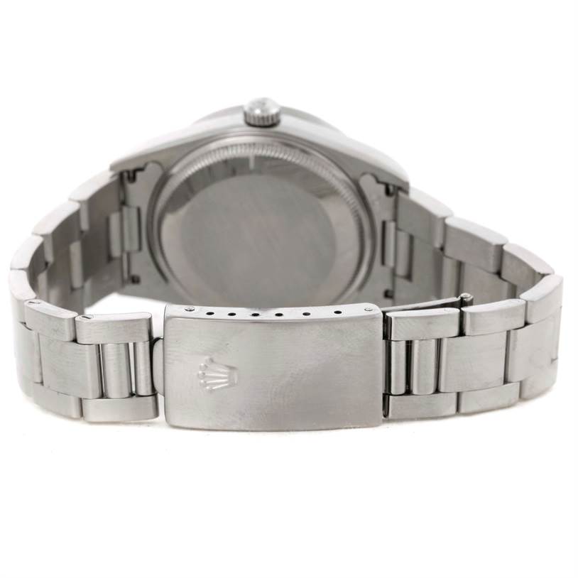 The image shows the back and bracelet of a Rolex Air-King 14010 Men's Stainless Steel Black Dial 14010 Men's Stainless Steel Black Dial watch with a focus on the clasp and case back.