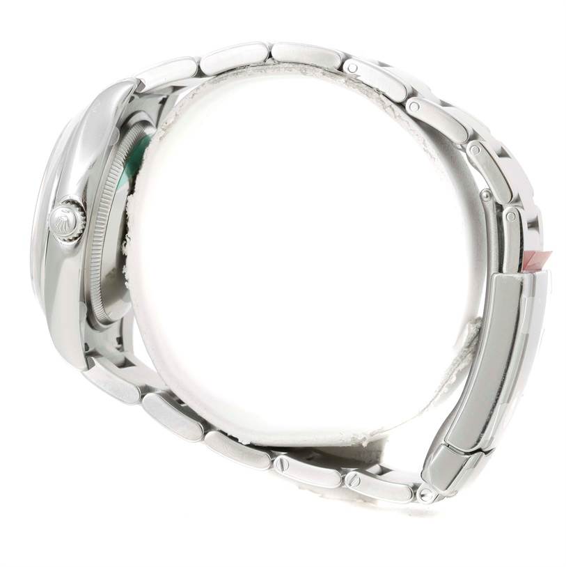 The image shows a Rolex Air-King 114200 Men's Stainless Steel Silver Dial 114200 Men's Stainless Steel Silver Dial watch from a side angle, highlighting its case, crown, and bracelet.