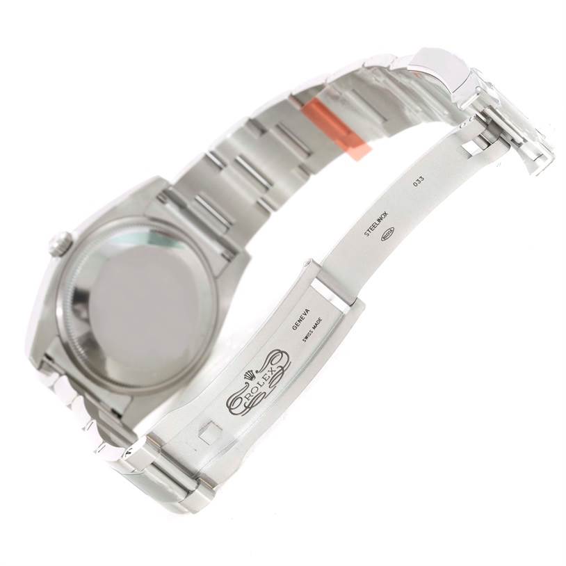 The image shows the back and inside of the bracelet clasp of a Rolex Air-King 114200 Men's Stainless Steel Silver Dial 114200 Men's Stainless Steel Silver Dial watch at an angled view.