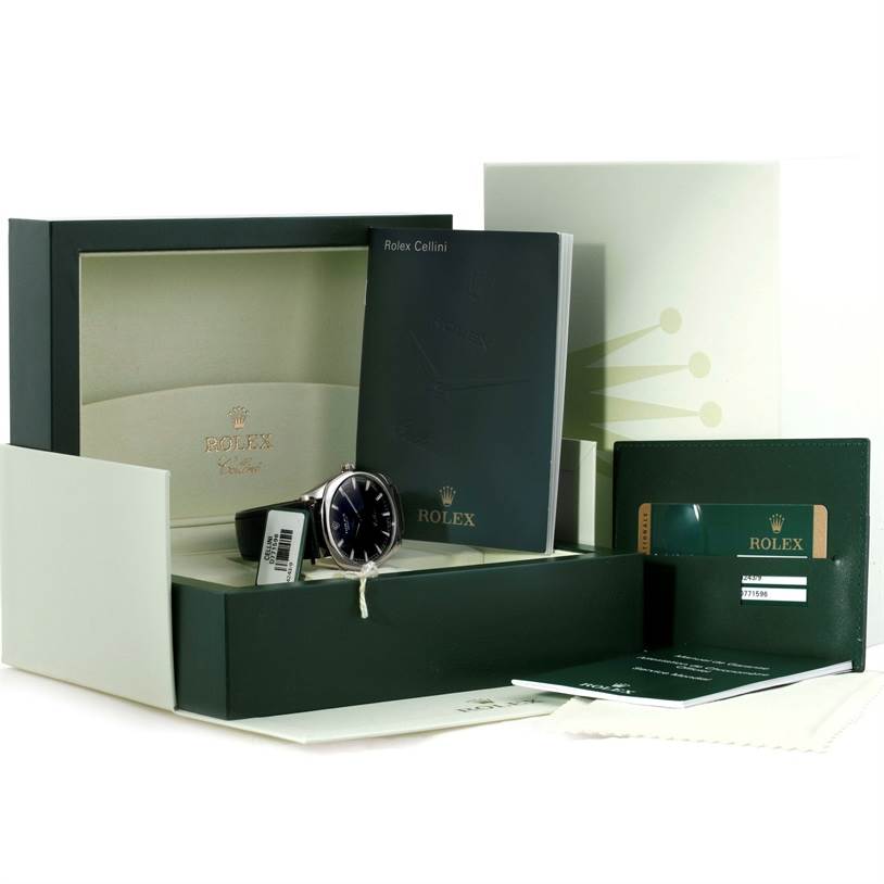 The image shows a Rolex Cellini 4243 Men's White Gold Black Dial 4243 Men's White Gold Black Dial watch with its box, warranty card, manual, and tags.