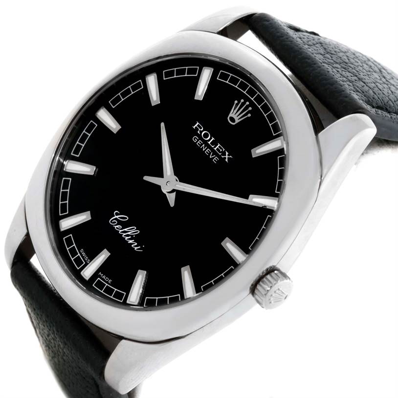 The image shows a close-up angle of a Rolex Cellini 4243 Men's White Gold Black Dial 4243 Men's White Gold Black Dial watch, highlighting its dial, hands, crown, and part of its leather strap.