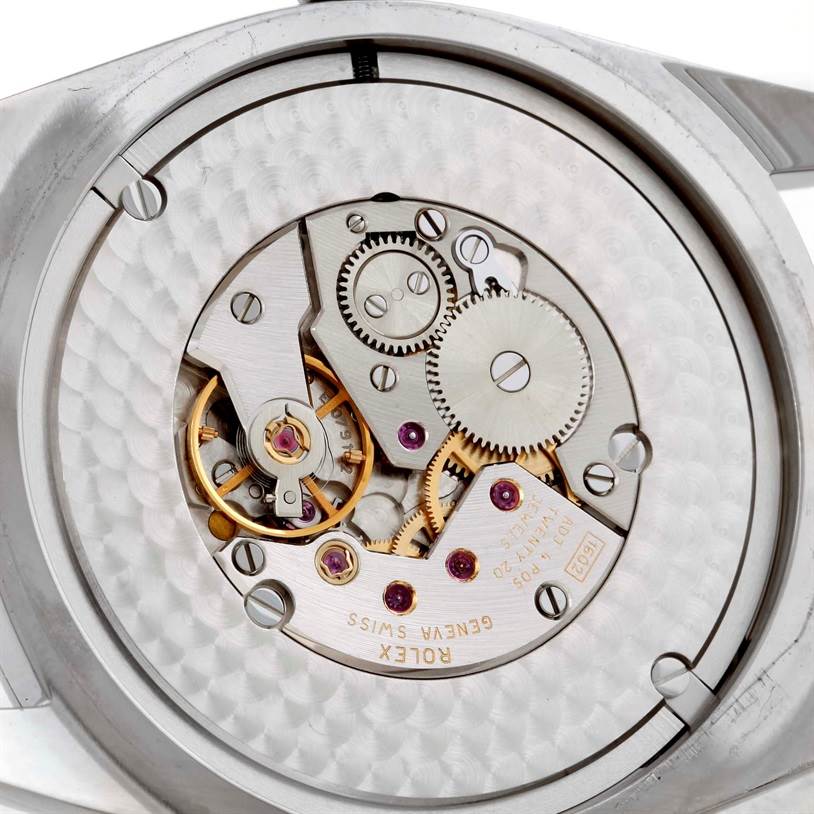 This image shows the intricate internal mechanical movement of a Rolex Cellini 4243 Men's White Gold Black Dial 4243 Men's White Gold Black Dial watch viewed from the back.