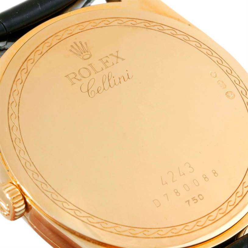 This image shows the back casing of a Rolex Cellini 4243 Men's Yellow Gold White Dial 4243 Men's Yellow Gold White Dial watch, displaying the engraved model information and decorative details.