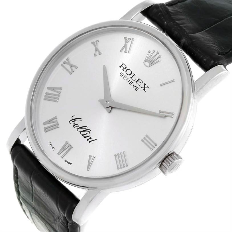 The image shows a close-up, tilted view of the Rolex Cellini 5116 Men's White Gold Silver Dial 5116 Men's White Gold Silver Dial watch, highlighting the dial, hands, crown, and leather strap.