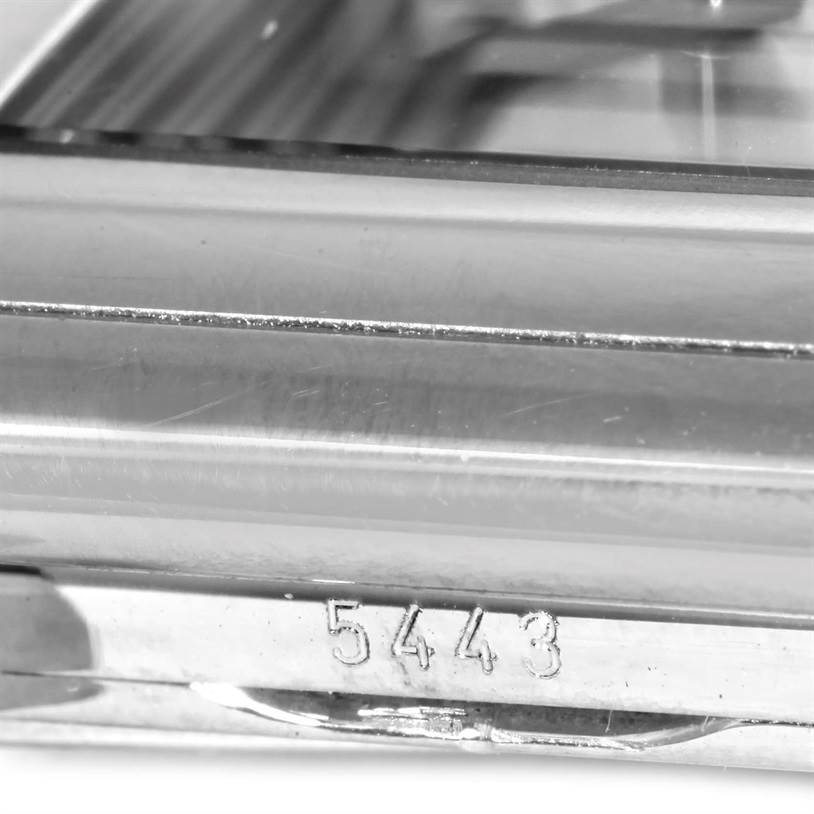 This image shows a close-up of the case side near the bezel with the model number "5443" of the Rolex Cellini 5443 Men's White Gold Black Dial 5443 Men's White Gold Black Dial watch.