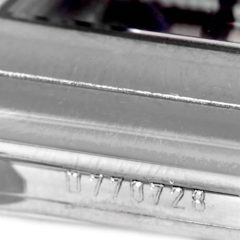 This image shows a close-up of the serial number on the casing of a Rolex Cellini 5443 Men's White Gold Black Dial 5443 Men's White Gold Black Dial watch.