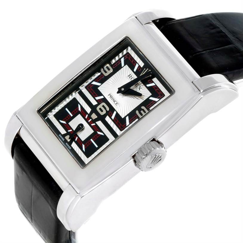 The image shows a close-up angle of a Rolex Cellini 5443 Men's White Gold Black Dial 5443 Men's White Gold Black Dial Prince watch, displaying its rectangular dial, crown, and part of the black leather strap.