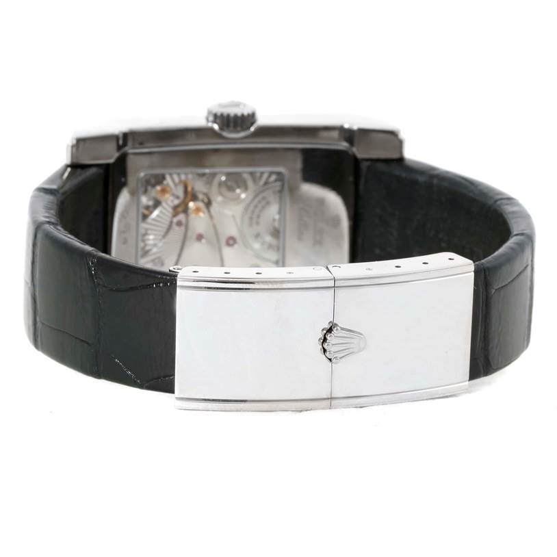 The image shows the back of a Rolex Cellini 5443 Men's White Gold Black Dial 5443 Men's White Gold Black Dial watch, highlighting the movement, crown, and clasp with the Rolex logo.