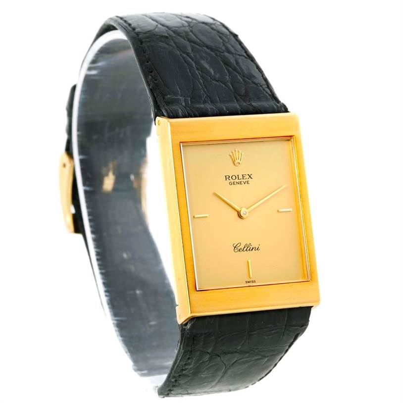 The image shows a front view of a Rolex Cellini 5071 Men's Yellow Gold Champagne Dial 5071 Men's Yellow Gold Champagne Dial watch, highlighting its rectangular face and black leather strap.