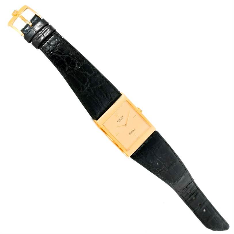 The Rolex Cellini 5071 Men's Yellow Gold Champagne Dial 5071 Men's Yellow Gold Champagne Dial watch is shown in a top-down view, displaying the entire watch including the dial, bezel, case, and strap.